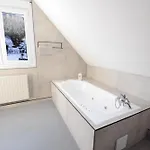 Au *